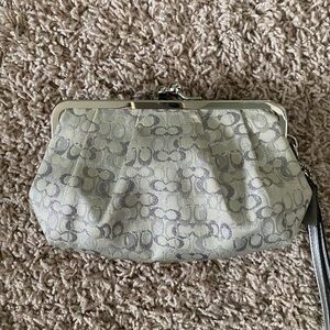 Coach Gray Clutch with Intricate Pattern and Metal Clasp
